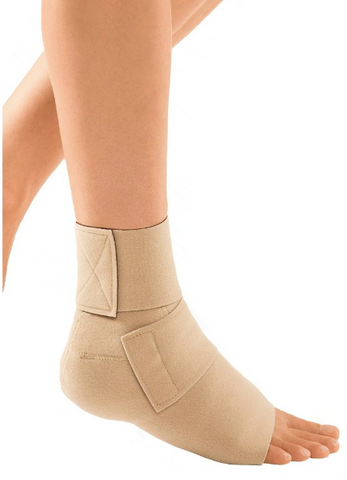 person wearing beige ankle compression wrap